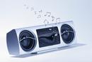 06-1661b Speaker with Music Notes Appearing from Mouth